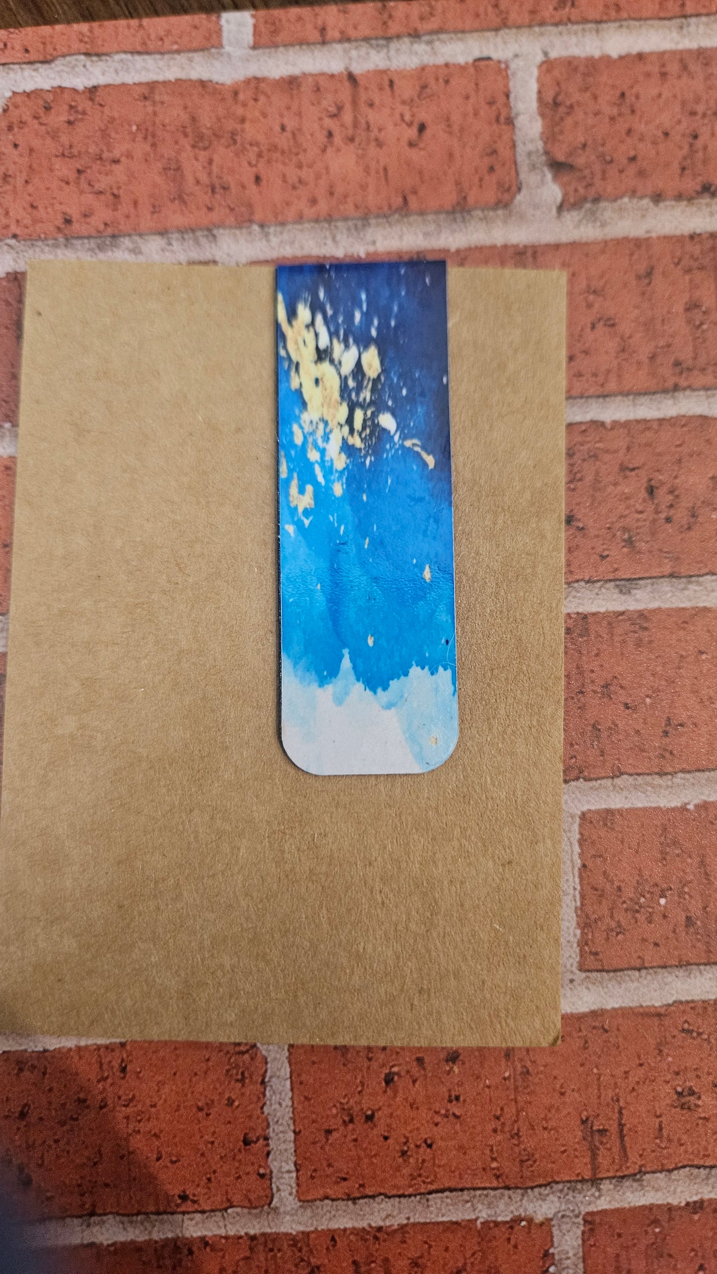 Blue and gold magnetic bookmark