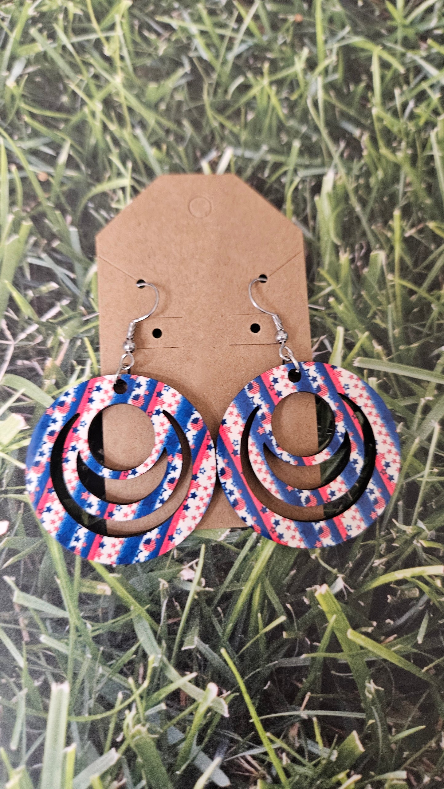 Stripes blue, red, white with small designs